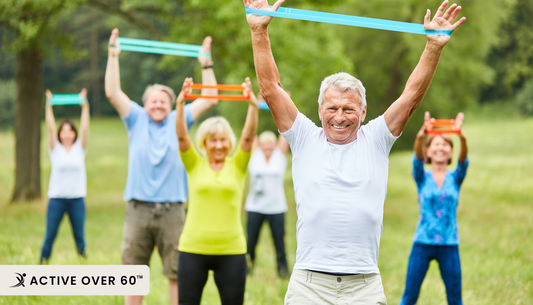 People exercising with resistance bands in the park