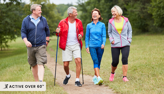 A group of people walking in the park