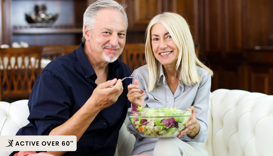 Two people eating at a table