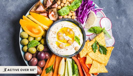 an assortment of vegetables and dip on a plate
