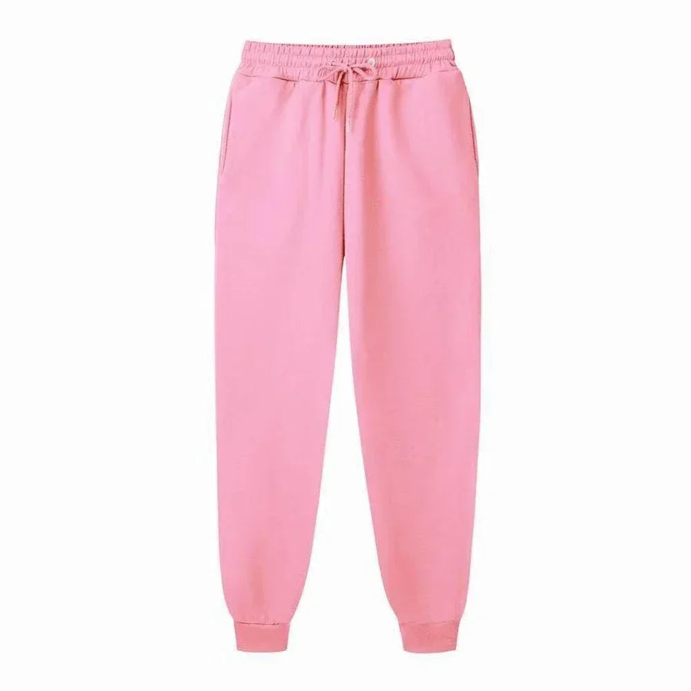 Loose fit sweatpants with ribbed cuffs designed for easy movement.