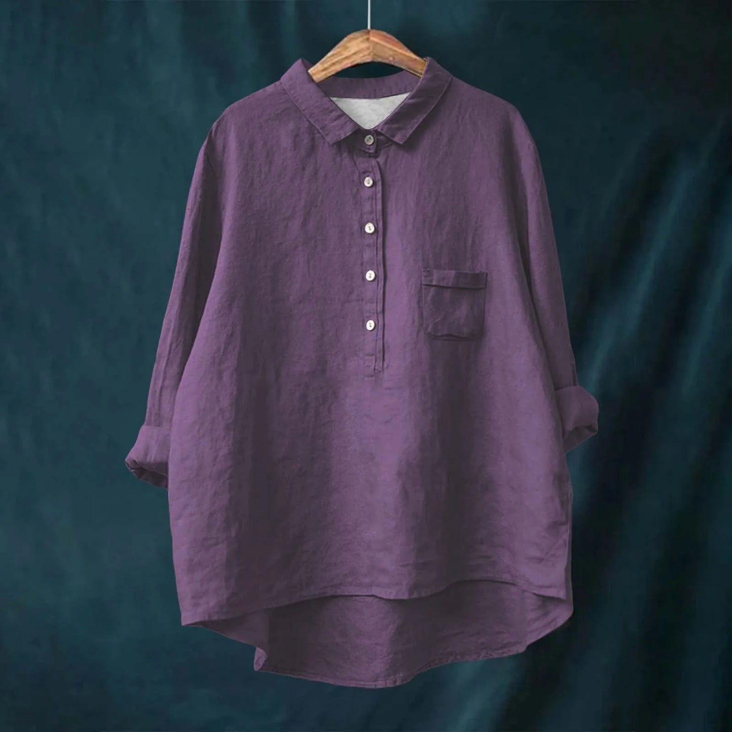 Elegant Floral Blouse for Vibrant Living displayed on hanger, showing vibrant pattern and non-stretch fabric texture.