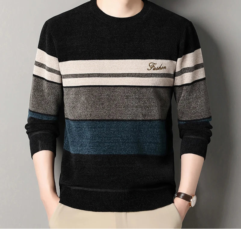 Side angle of a men's striped knit pullover sweater styled with jeans