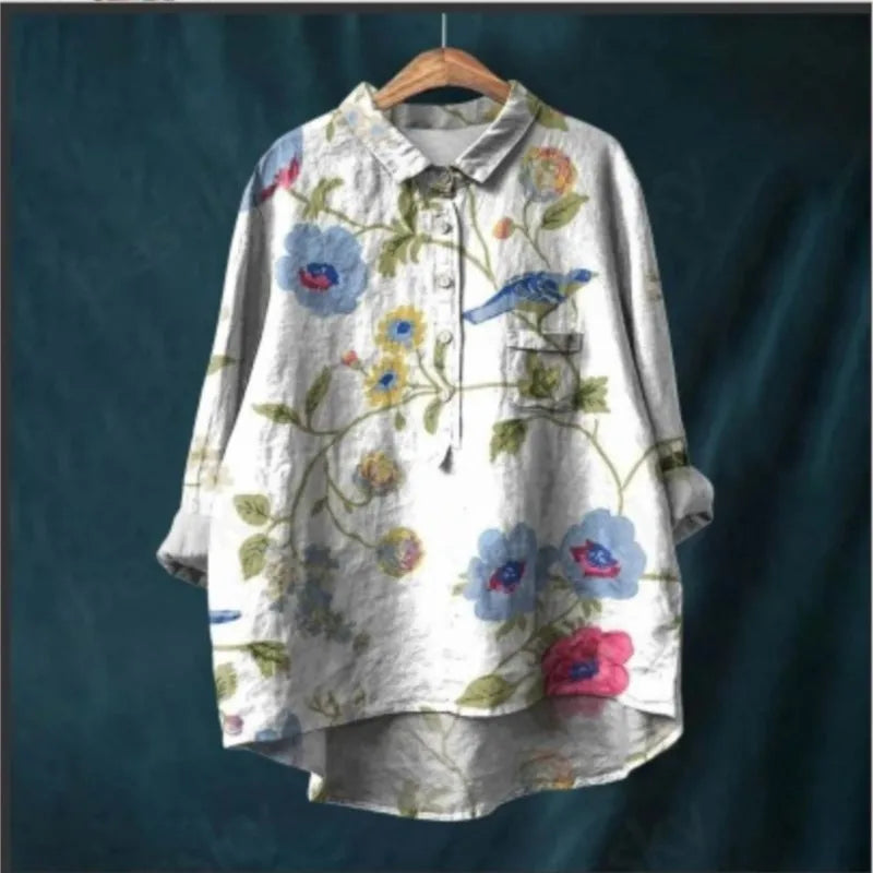Nine-quarter sleeve detail on a Prairie Chic floral blouse designed for vibrant living and transitional weather.