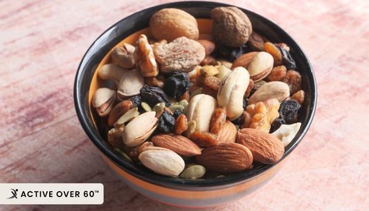a bowl filled with mixed nuts and dried fruits