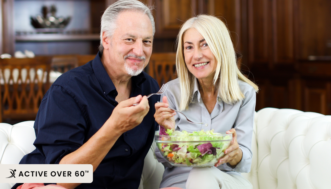 Two people eating at a table