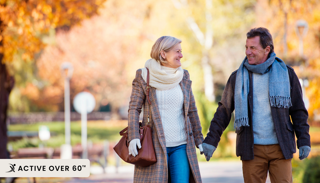 A couple walking in an autumn park