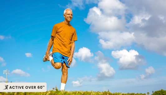A person is running on a grassy field