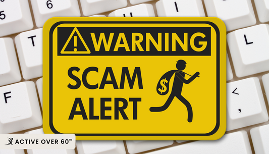 scam alert sign on computer keyboard