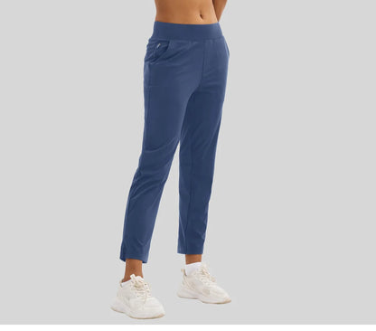 Ankle-length casual pants in solid color designed for hiking, jogging, and golf