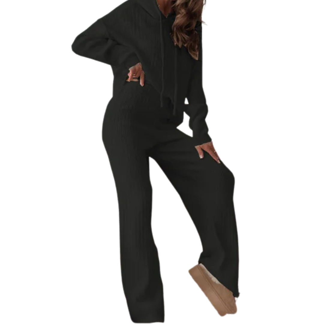 Relaxed-fit winter outfit for active seniors, including elastic waist pants in black