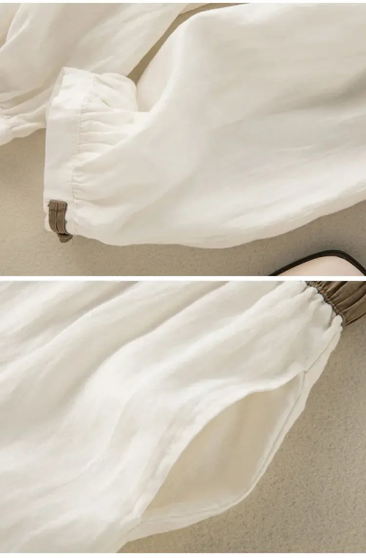 Close-up of a white garment with a beige background