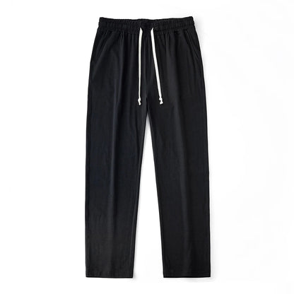 Men’s solid color sport pants with drawstring waist and straight-leg fit