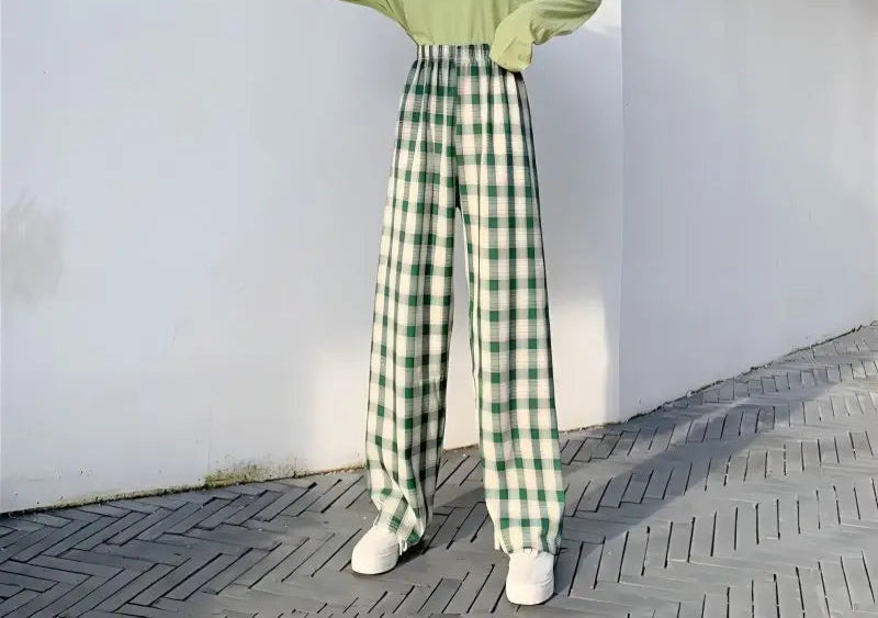 Comfortable wide leg plaid trousers with subtle applique details and elastic waist for easy pull-on style