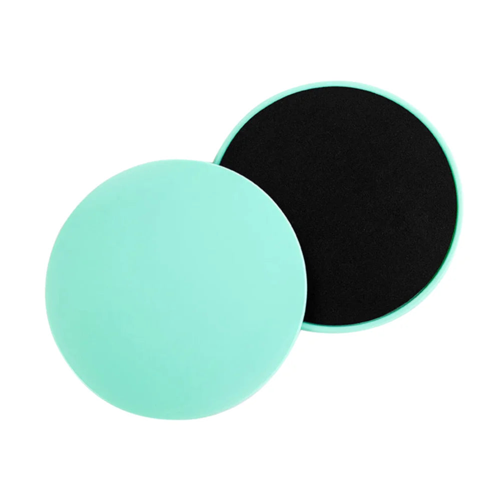 A set of dual-sided gliding discs in green colors being used for fitness exercises on a floor, with the text '2-10PCS' indicating the quantity available.