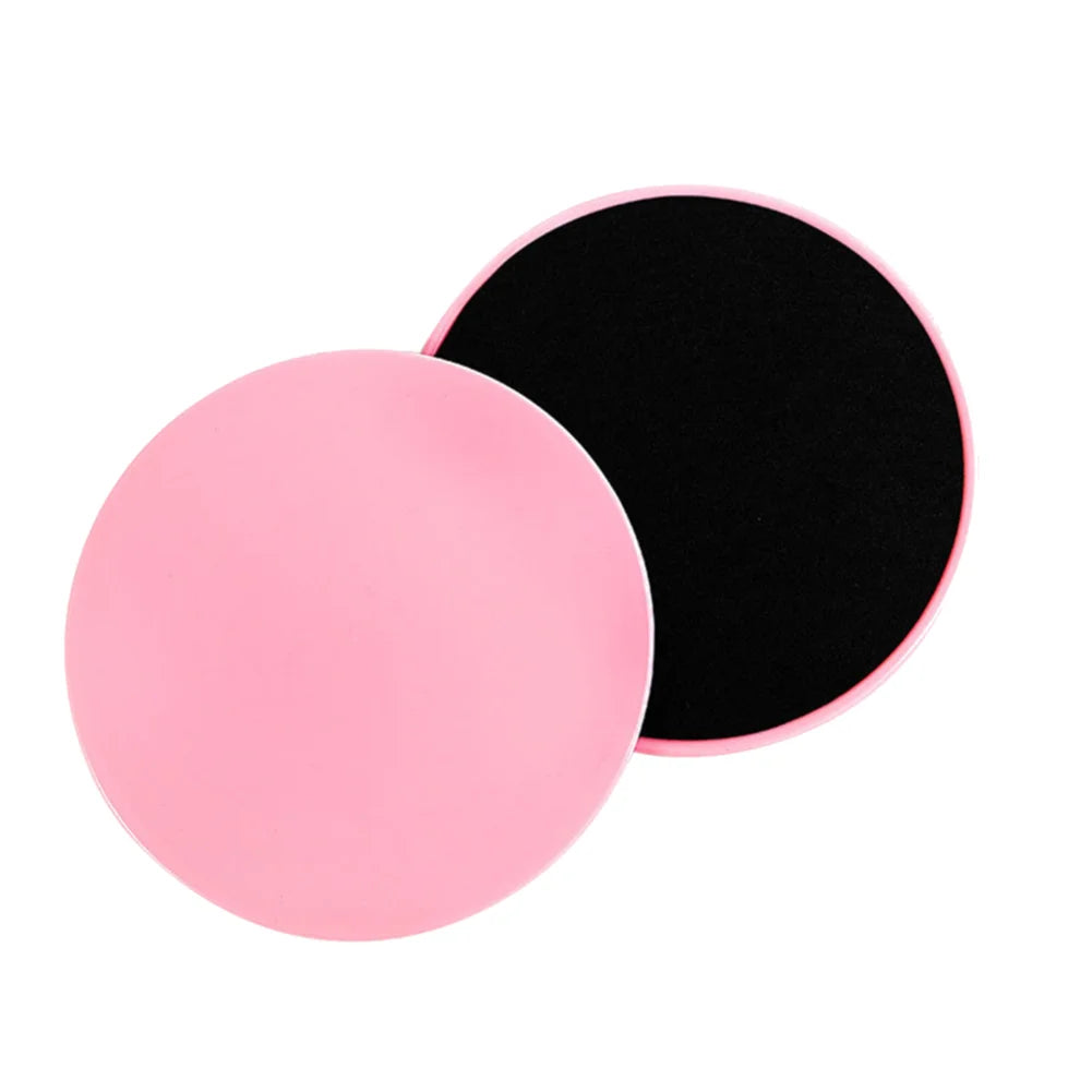 A set of dual-sided gliding discs in pink colors being used for fitness exercises on a floor, with the text '2-10PCS' indicating the quantity available.
