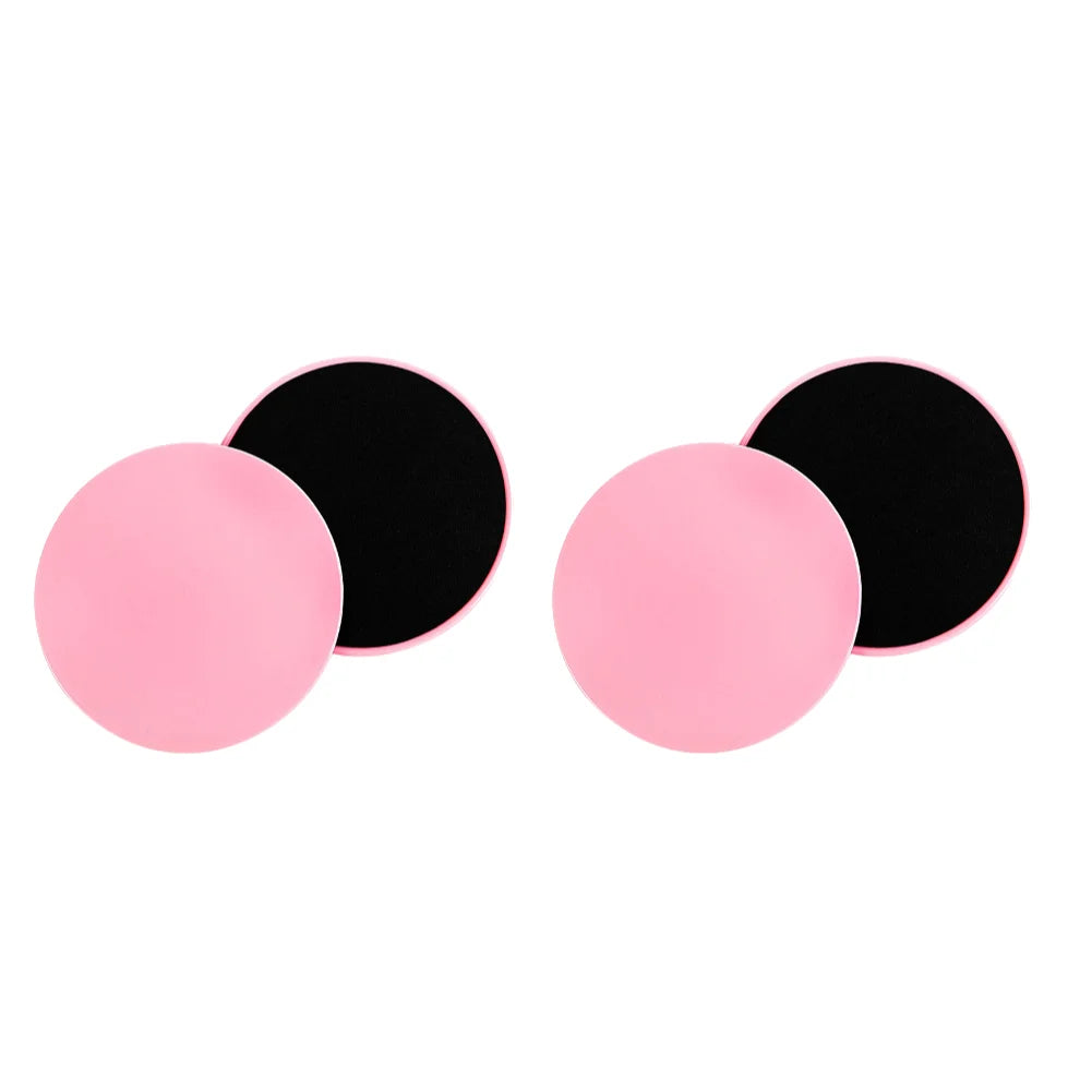 A set of dual-sided gliding discs in pink colors being used for fitness exercises on a floor, with the text '2-10PCS' indicating the quantity available.