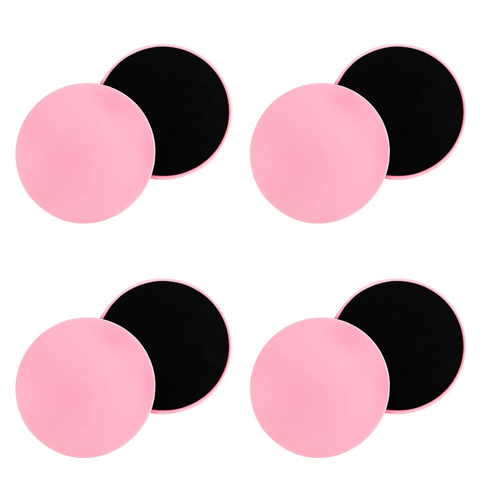 A set of dual-sided gliding discs in pink colors being used for fitness exercises on a floor, with the text '2-10PCS' indicating the quantity available.