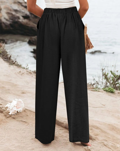 Elegant black pants with side pockets and breathable fabric