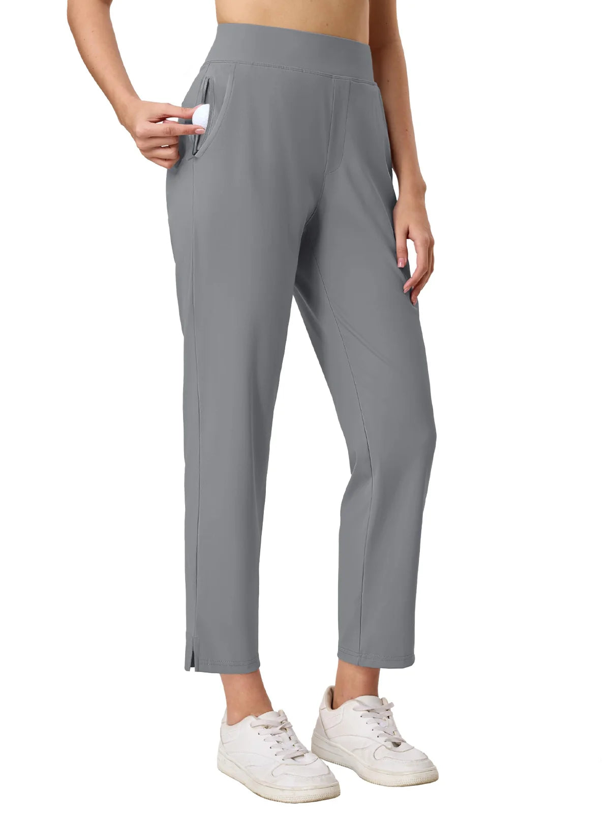 Gray pants worn by a person on a white background