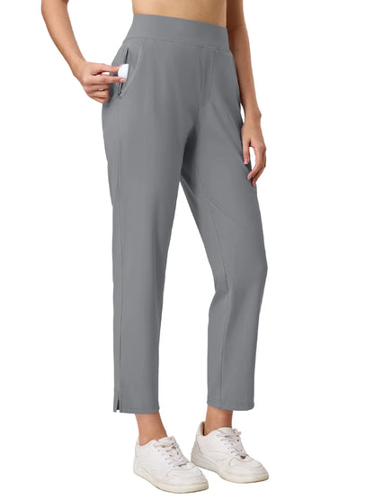Gray pants worn by a person on a white background