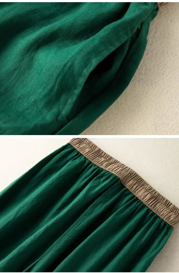 Green fabric with brown trim on a neutral background