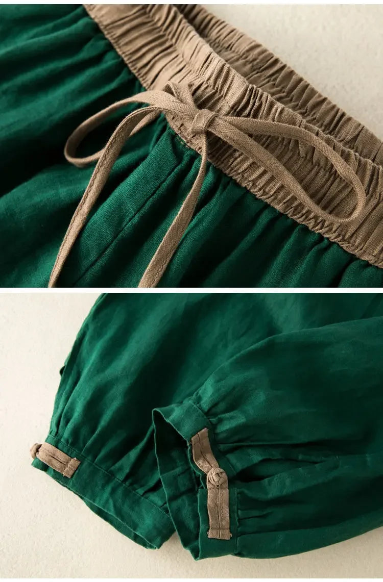 Green fabric with brown trim and ties on a beige background