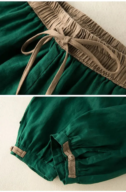 Green fabric with brown trim and ties on a beige background