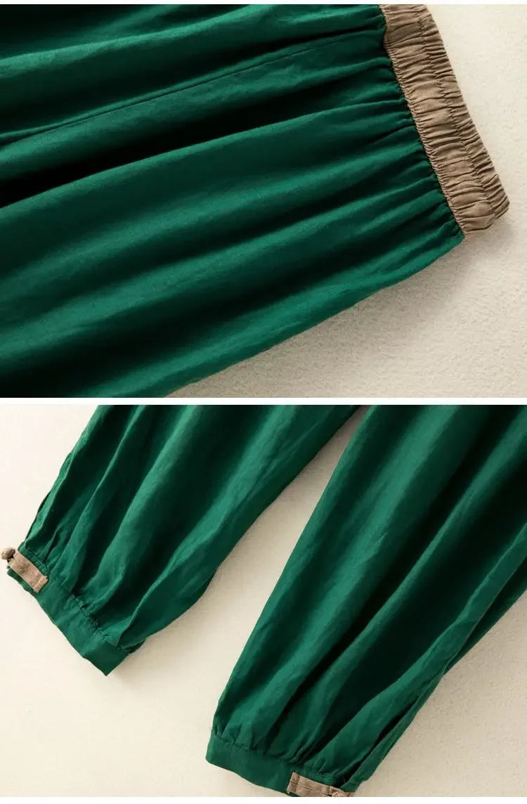 Green pants with brown trim on a beige background