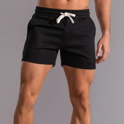 Men’s gym and workout shorts in solid black with modern fit