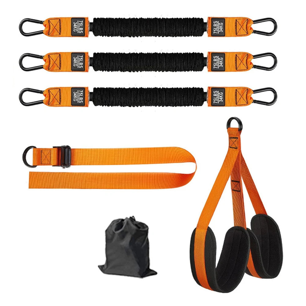 Set of orange and black resistance bands with a carrying bag on a white background