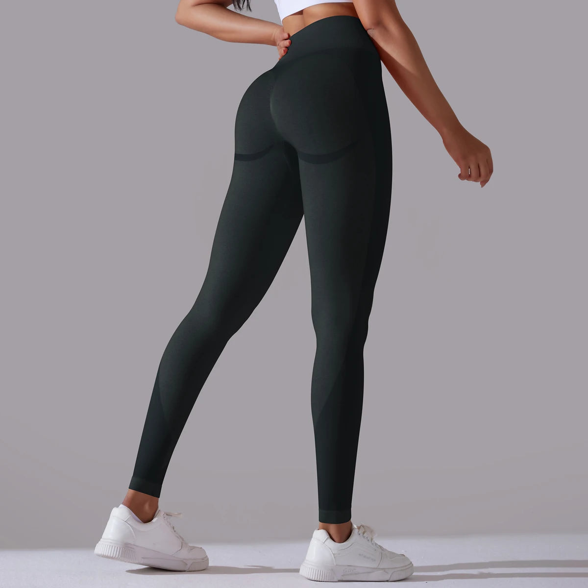 A pair of high-waist black breathable nylon yoga leggings, featuring a wide elastic waistband and designed for active wear.
