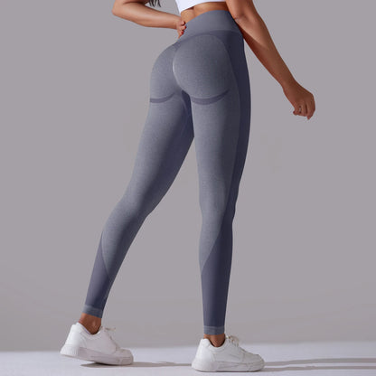 A pair of high-waist navy breathable nylon yoga leggings, featuring a wide elastic waistband and designed for active wear.