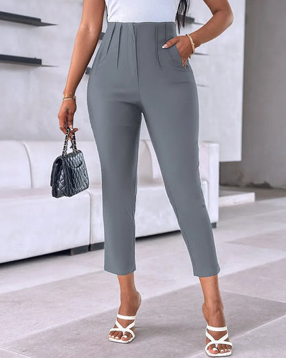 High waist slim office suit pants with zipper fly closure and functional pockets in blended cotton polyester fabric
