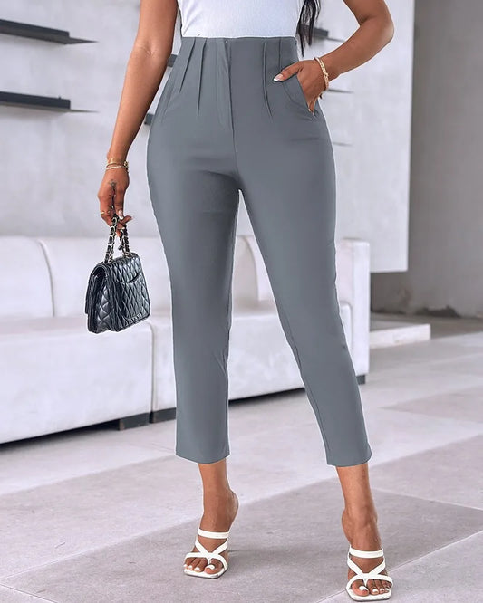 High waist slim office suit pants with zipper fly closure and functional pockets in blended cotton polyester fabric