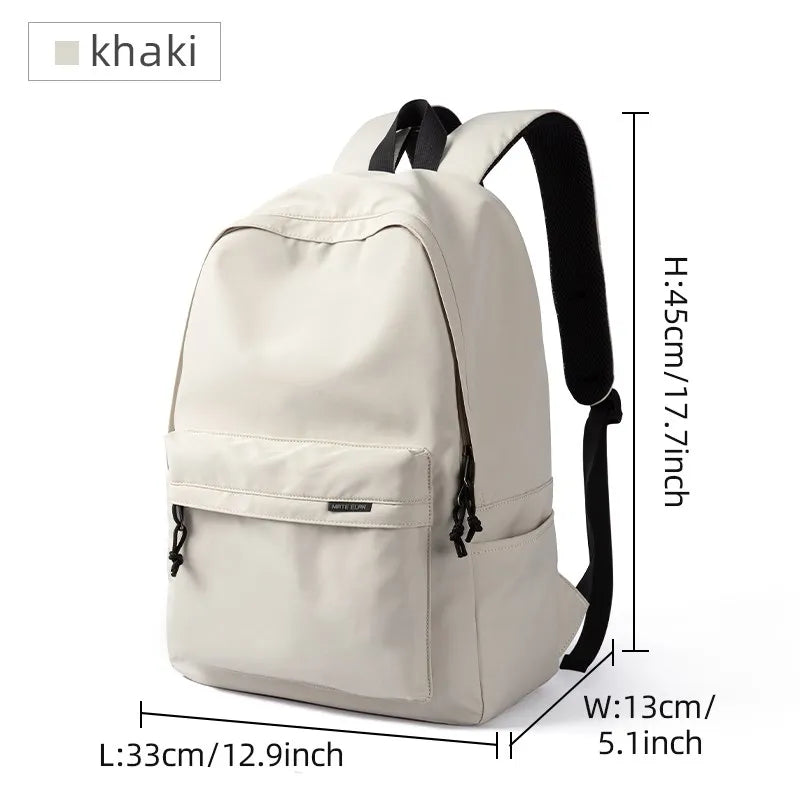 A white lightweight waterproof sports travel backpack with a front pocket and side straps.