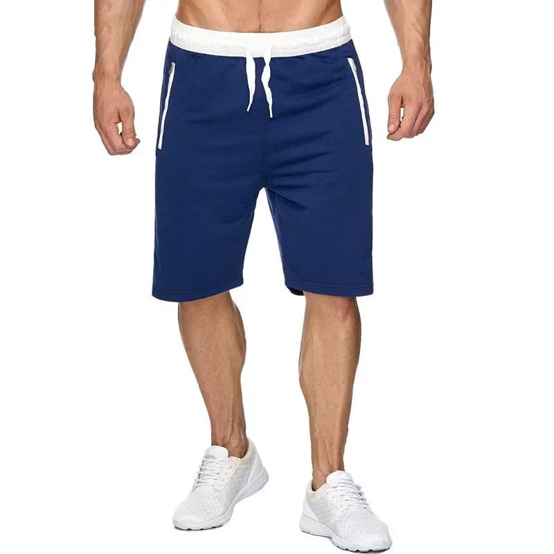 A collection of men's beach shorts with zip pockets, displayed in blue colors such. The shorts feature a loose fit, adjustable drawstring closure, and secure zip pockets.