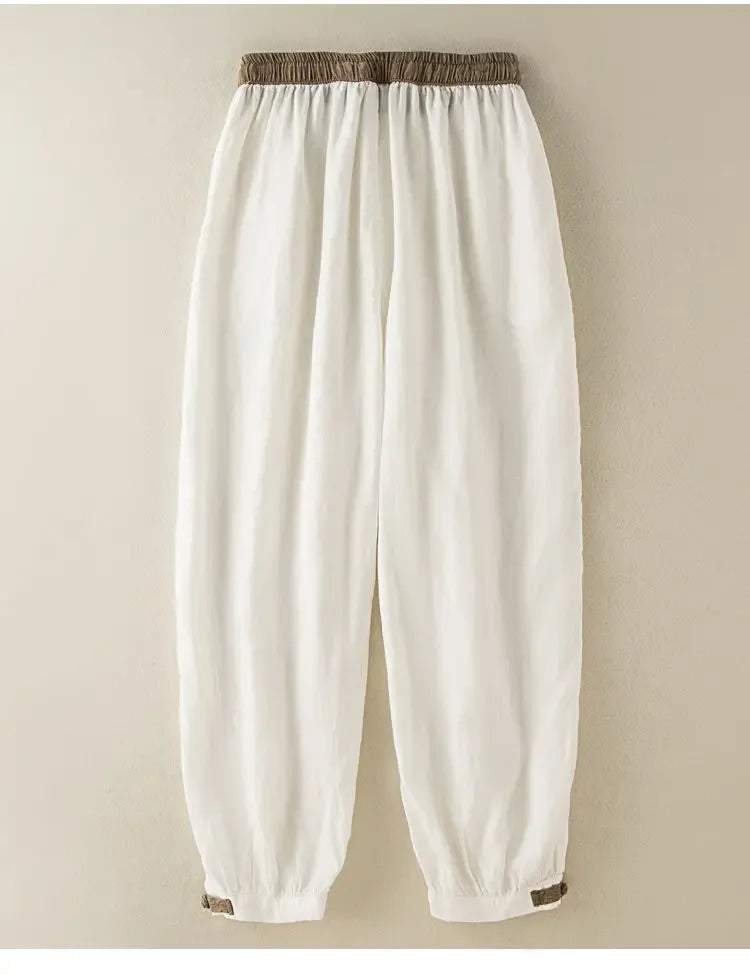Mid-rise elastic waist casual pants in white, loose fit with no decoration for easy mix and match.