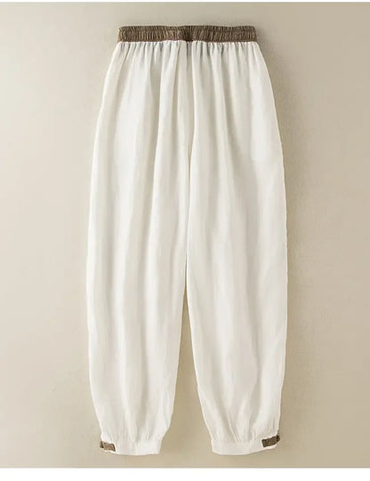 Mid-rise elastic waist casual pants in white, loose fit with no decoration for easy mix and match.