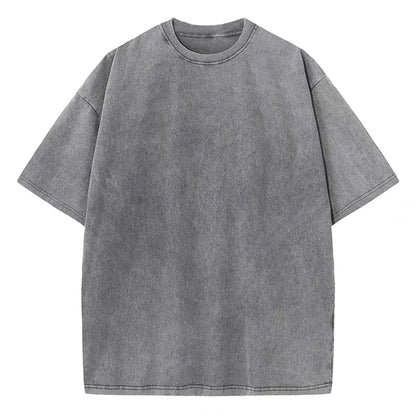 An oversized black cotton vintage casual t-shirt with short sleeves and a round neckline.