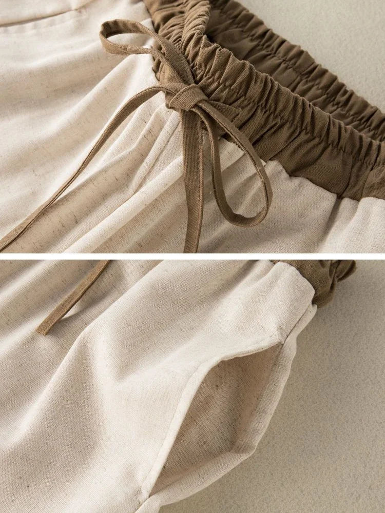 Relaxed-fit apricot pants with elastic mid-rise waistband, ideal for active lifestyles and casual outings.