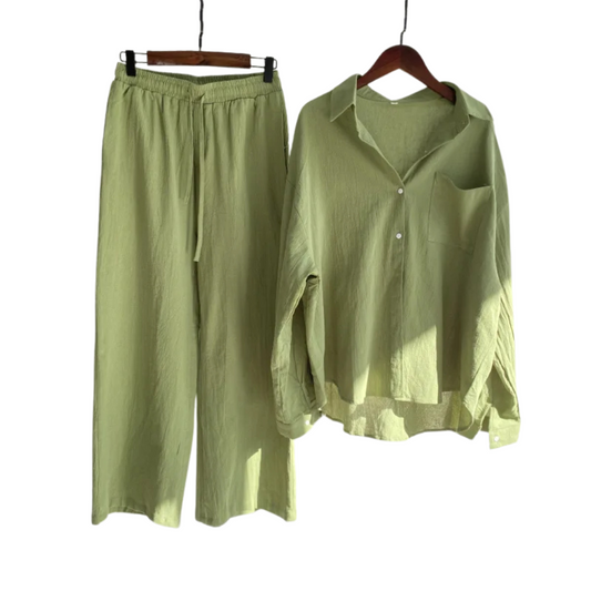 Retro oversized cotton-linen shirt and pants set laid flat, highlighting its loose fit and breathable fabric.
