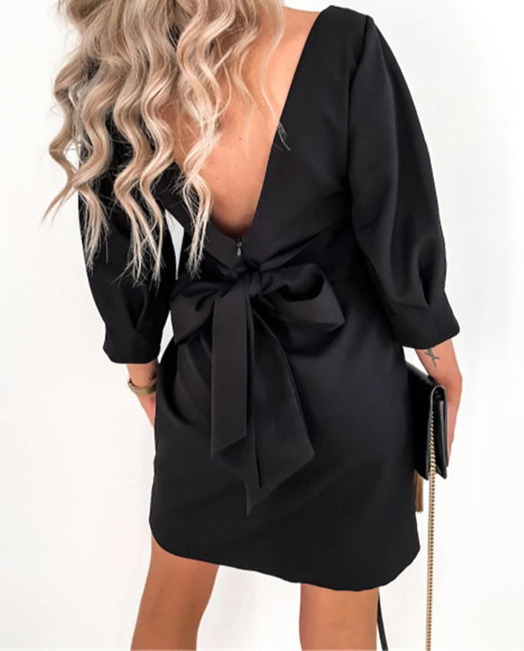 Backless bow dress in soft fabric, ideal for senior-friendly evening wear
