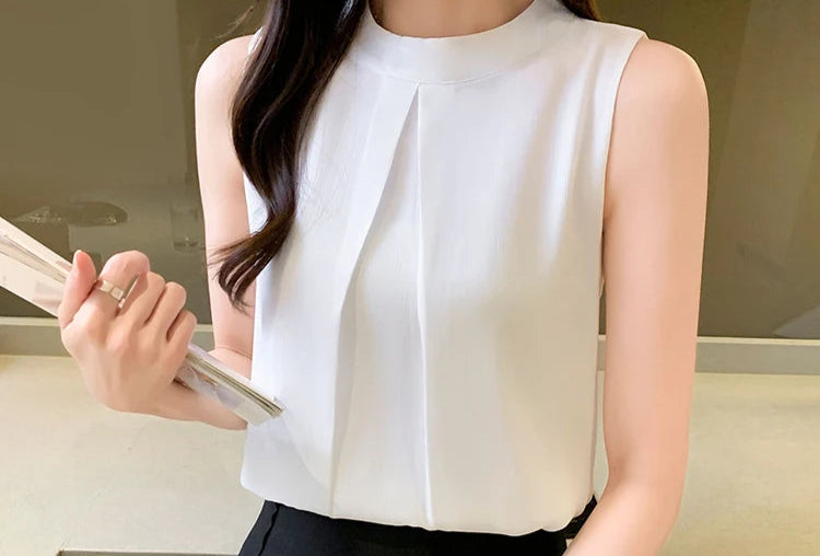 Soft chiffon sleeveless shirt for women, perfect for warm weather layering or standalone wear.