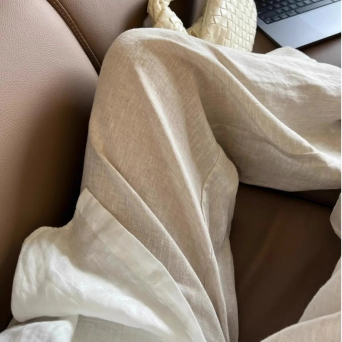 Minimalist wide-leg linen trousers with structured shape and solid color design