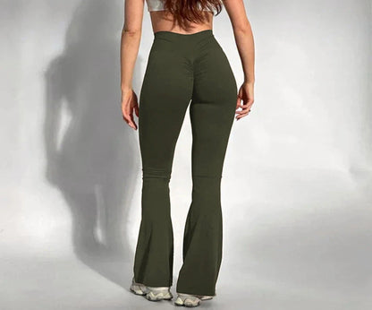 
Solid color yoga pants with high waist support, flared legs, and breathable performance fabric