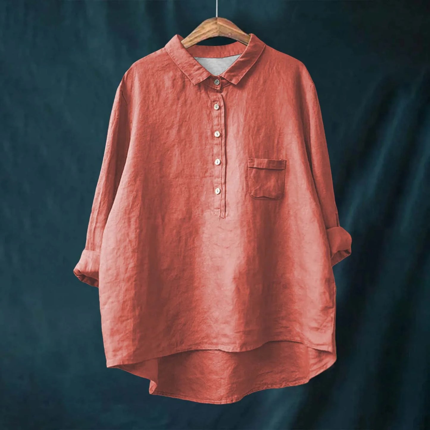 Lightweight polyester floral blouse draped naturally, showing breathable fabric perfect for year-round wear.