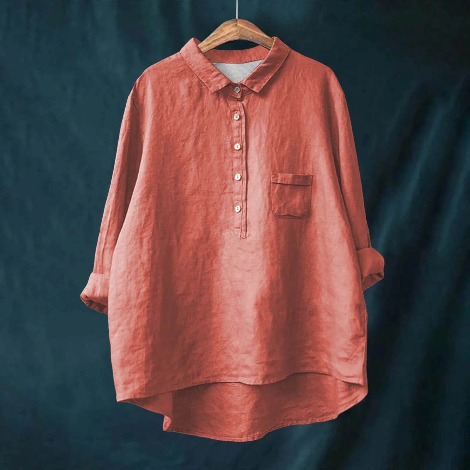 Lightweight polyester floral blouse draped naturally, showing breathable fabric perfect for year-round wear.