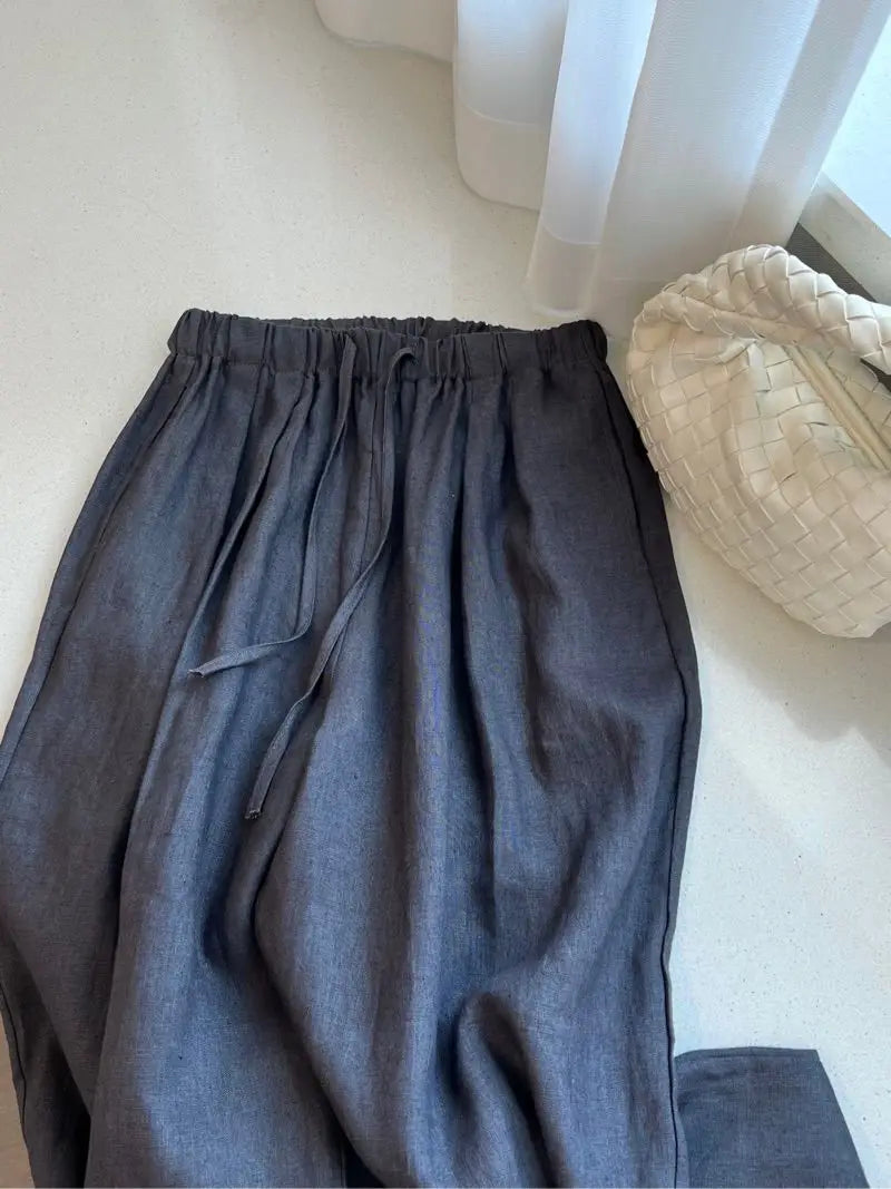 Loose linen wide pants in solid color with ankle-grazing length and roomy leg design