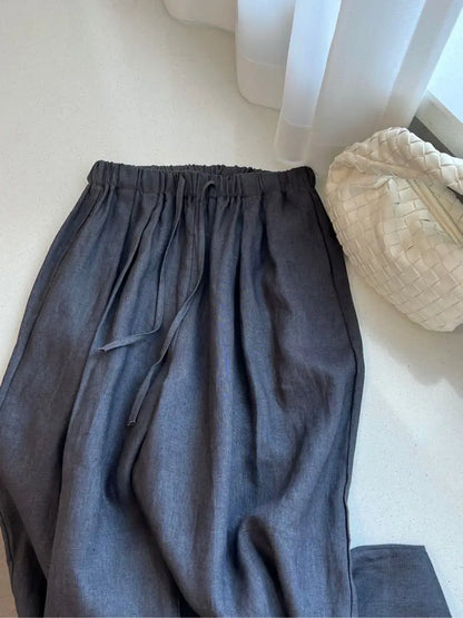 Loose linen wide pants in solid color with ankle-grazing length and roomy leg design